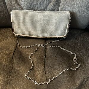 Silver studded clutch